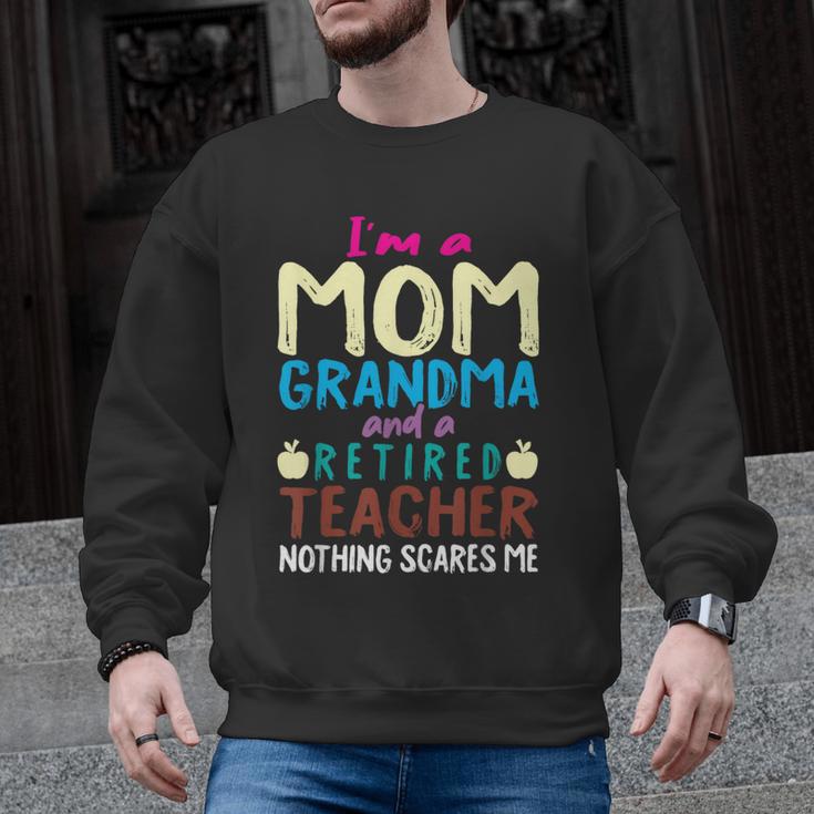I'm Mom Grandma And A Retired Teacher Nothing Scares Me Men Women Men Graphic Sweatshirt