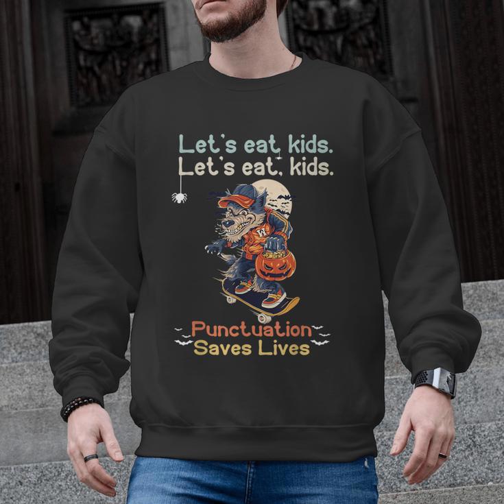 Let's Eat Kids Grammar Werewolf Halloween Teacher Men Graphic Sweatshirt