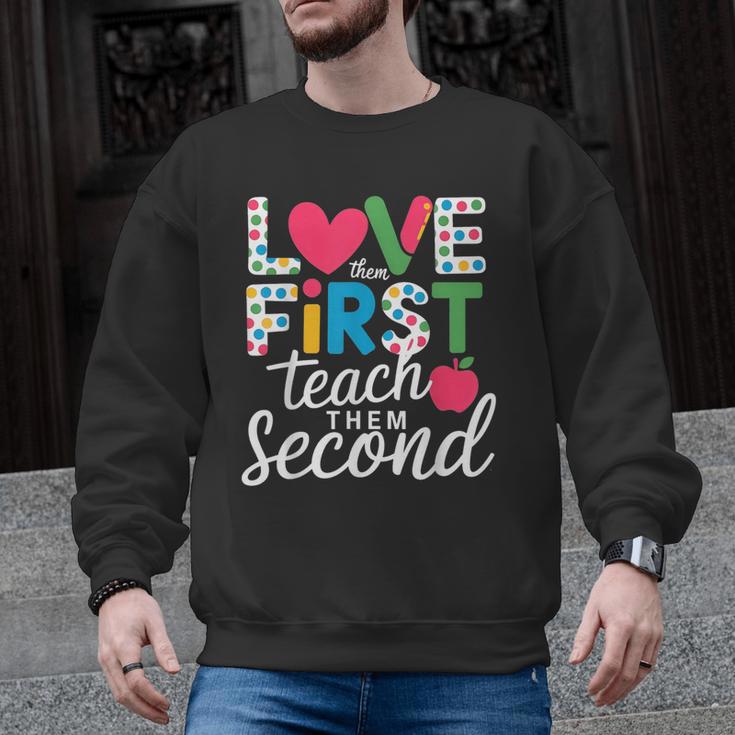 Love Them First Teach Them Second Teacher Student Love Quote Men Graphic Sweatshirt
