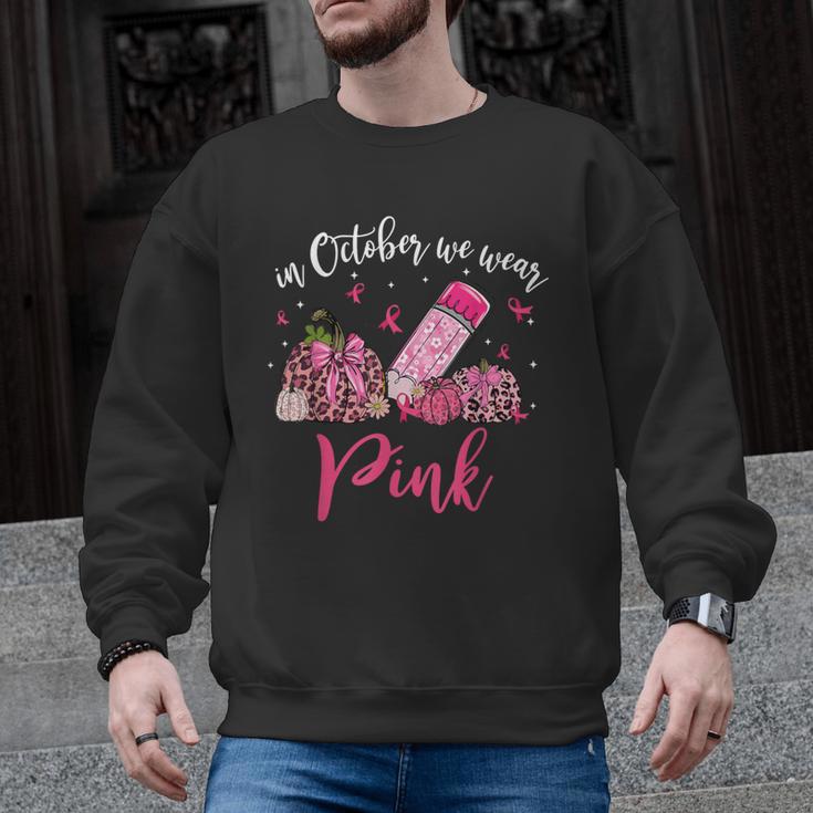 In October We Wear Pink Apple Teacher Daisy Breast Cancer Men Graphic Sweatshirt