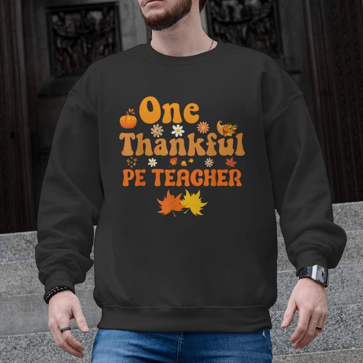 One Thankful PE Teacher Thanksgiving Fall Autumn Groovy Men Graphic Sweatshirt