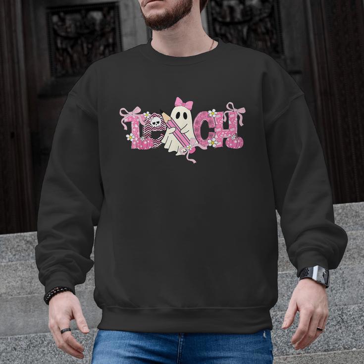 Pink Ghost Teach Halloween Teacher In Spooky Season Men Graphic Sweatshirt