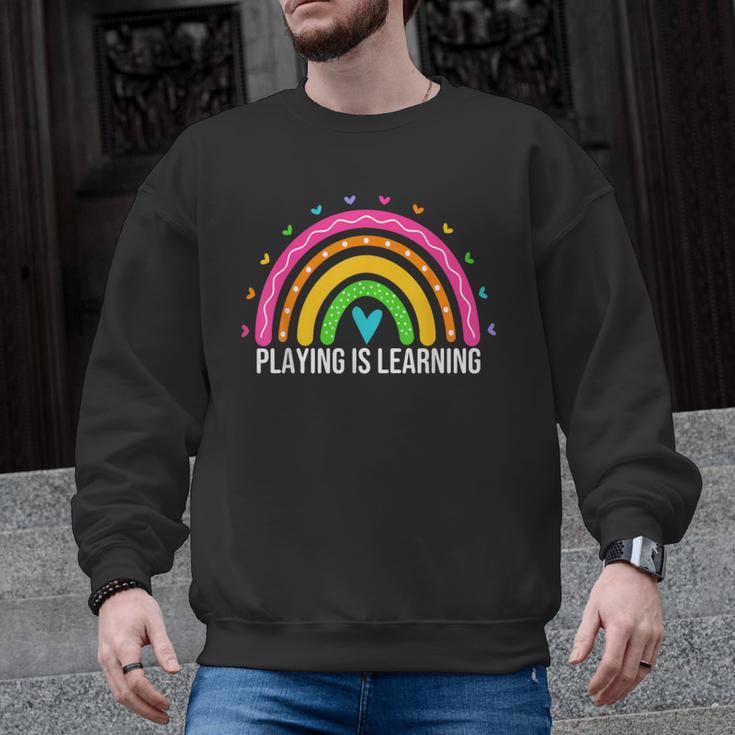 Playing Is Learning Early Childhood Education ECE Teacher Men Graphic Sweatshirt