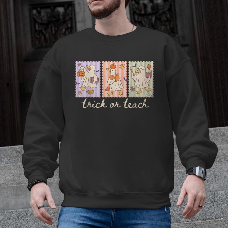 Preppy Goose Teacher Trick Or Teach Halloween Teacher Goose Men Graphic Sweatshirt