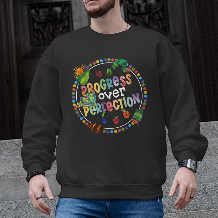 Progress Over Perfection Caterpillar Back To School Teacher Men Graphic Sweatshirt