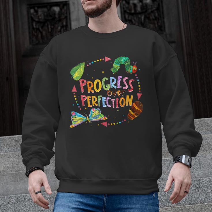 Progress Over Perfection Caterpillar Teacher Back To School Men Graphic Sweatshirt