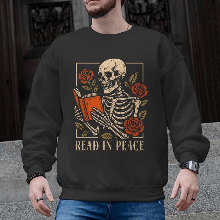 Read In Peace Skeleton Reading Book Halloween Teacher Men Graphic Sweatshirt