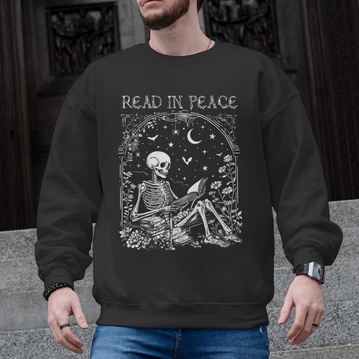 Read In Peace Skeleton Reading Teacher Spooky Halloween Men Graphic Sweatshirt