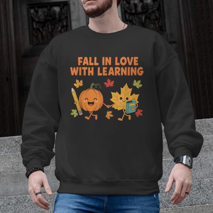 Retro Fall In Love With Learning Autumn Pumpkin Teacher Men Graphic Sweatshirt