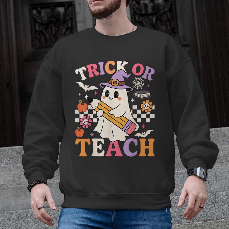 Retro Floral Ghost Trick Or Teach Groovy Teacher Halloween Men Graphic Sweatshirt