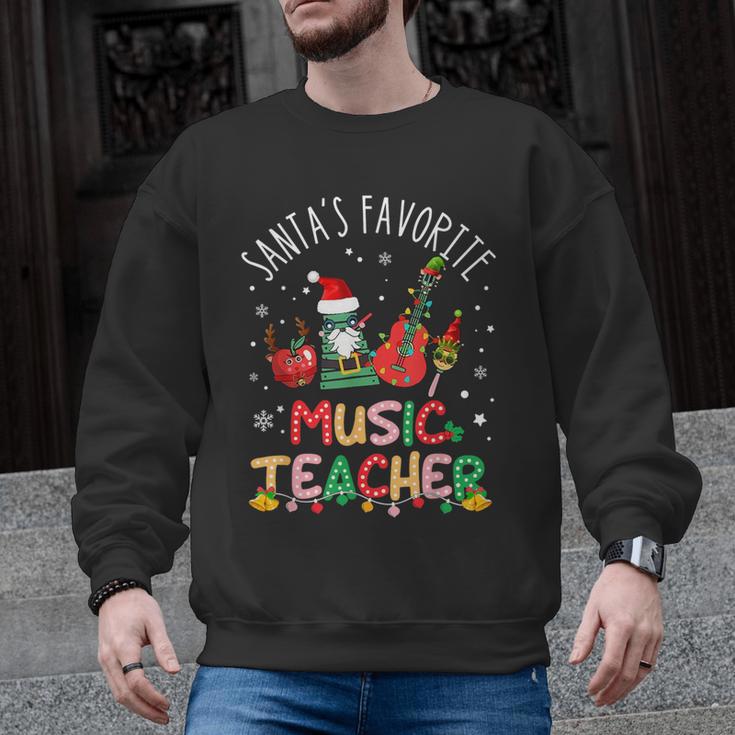 Santa's Favorite Music Teacher Christmas Santa Hat Matching Men Graphic Sweatshirt