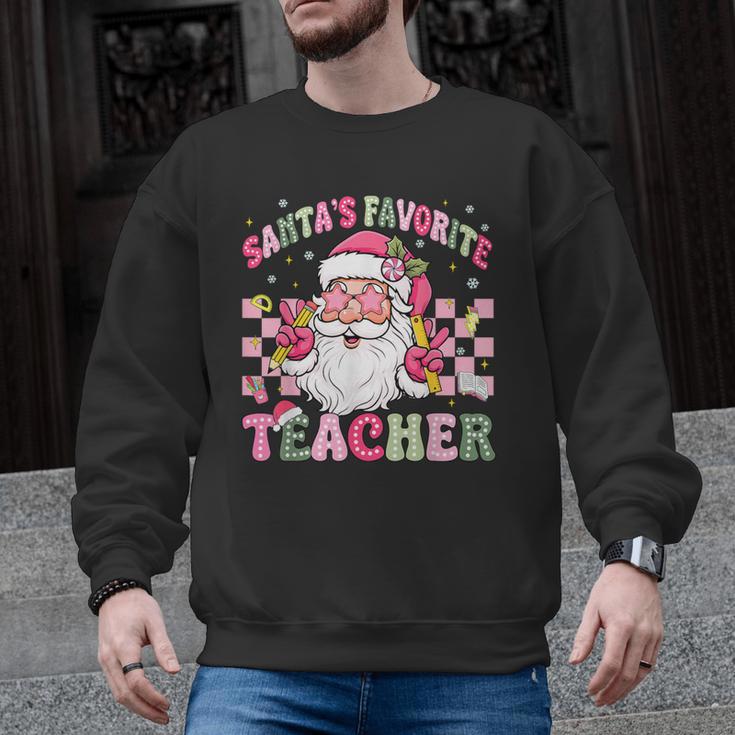 Santa's Favorite Teacher Groovy Christmas Teacher Boys Girls Men Graphic Sweatshirt
