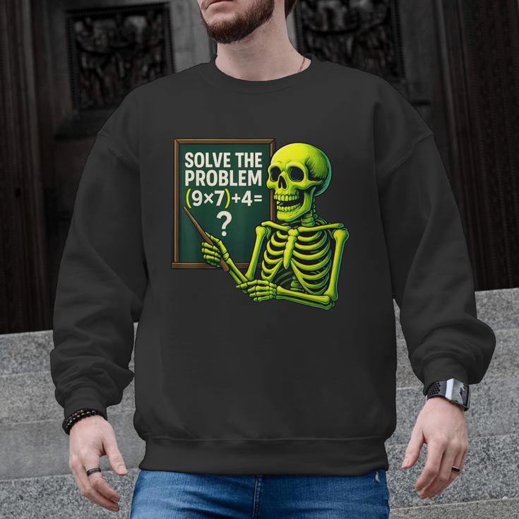 Solve The Problem Skeleton Teacher Halloween Math Six Seven Men Graphic Sweatshirt