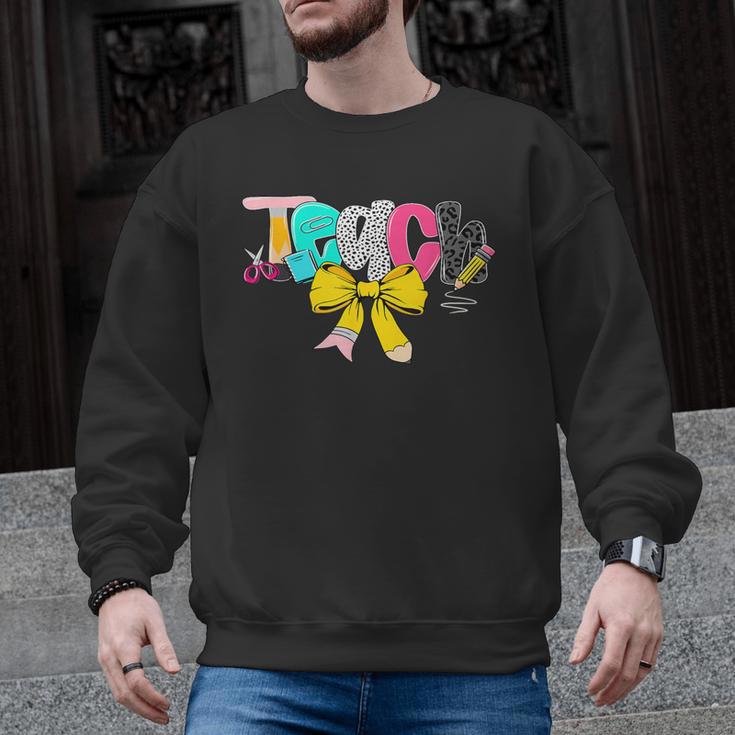 Teach Coquette Bow Teacher Back To School Happy First Day Men Graphic Sweatshirt