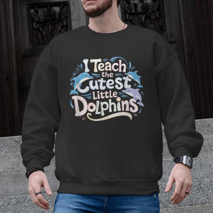 I Teach The Cutest Little Dolphins Cute Animal Teacher Men Graphic Sweatshirt