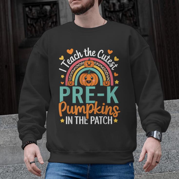 I Teach The Cutest Pre-K Pumpkin Teacher Student Halloween Men Graphic Sweatshirt