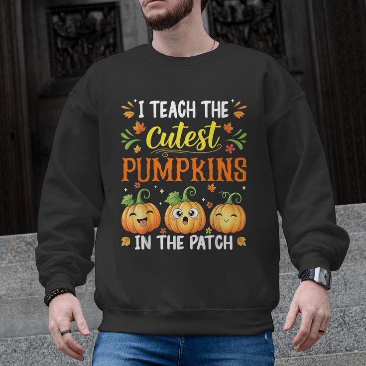 I Teach The Cutest Pumpkins Halloween Teacher Men Graphic Sweatshirt