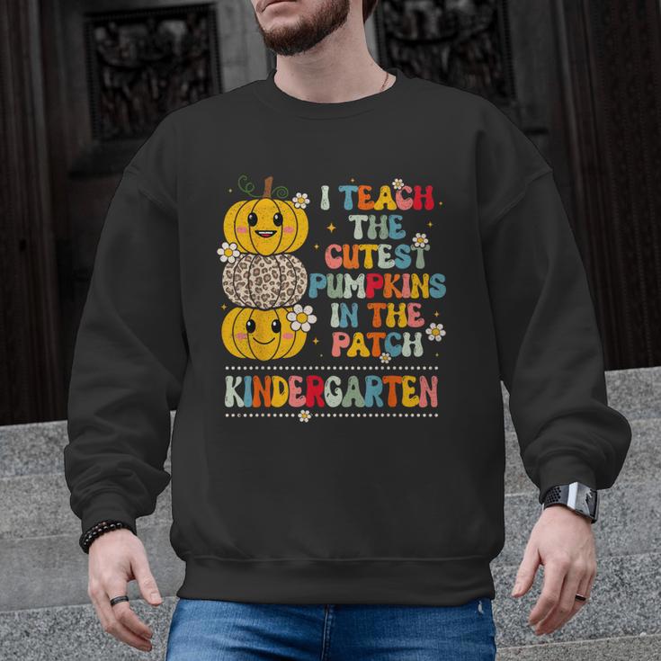 I Teach The Cutest Pumpkins Kindergarten Teacher Halloween Men Graphic Sweatshirt