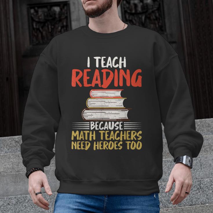 I Teach Reading Because Math Teachers Need Heroes Too Men Women Men Graphic Sweatshirt