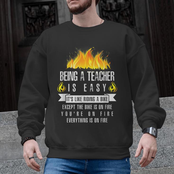 Being a Teacher Is Easy Everything Is On Fire T-Shirt For Men Women Kids Men Graphic Sweatshirt