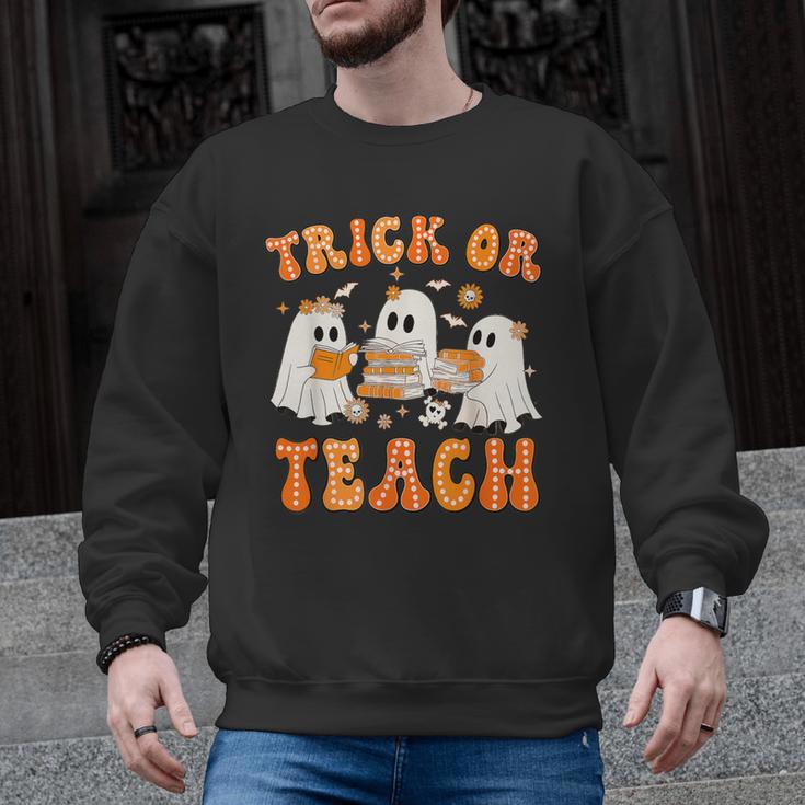 Teacher Halloween Trick Or Teach Retro Groovy Floral Ghost Men Graphic Sweatshirt