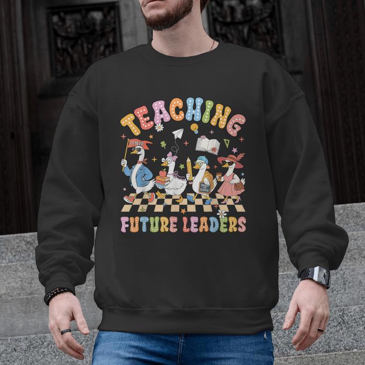 Teaching Future Leaders Teacher Back To School Cute Goose Men Graphic Sweatshirt