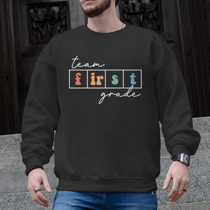 Team First Grade Back To School 1st Grade Teacher Kids Cute Men Graphic Sweatshirt