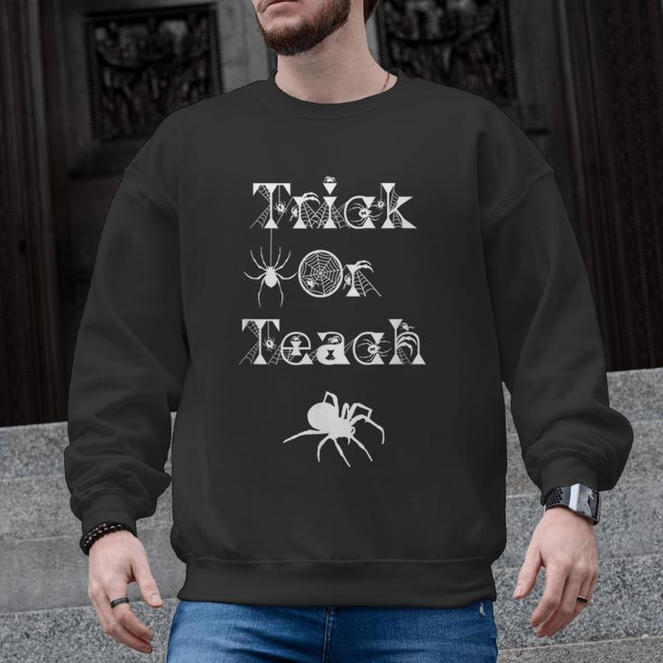 Trick Or Teach Halloween Teacher Shirt Teaching Spider Tee For Men Women Kids Men Graphic Sweatshirt