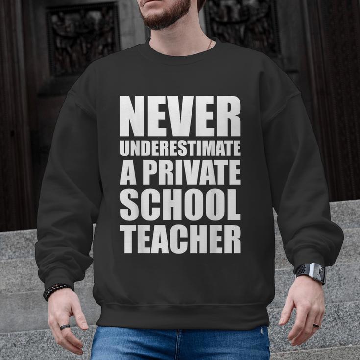 Never Underestimate A Private School Teacher Back To School Men Graphic Sweatshirt