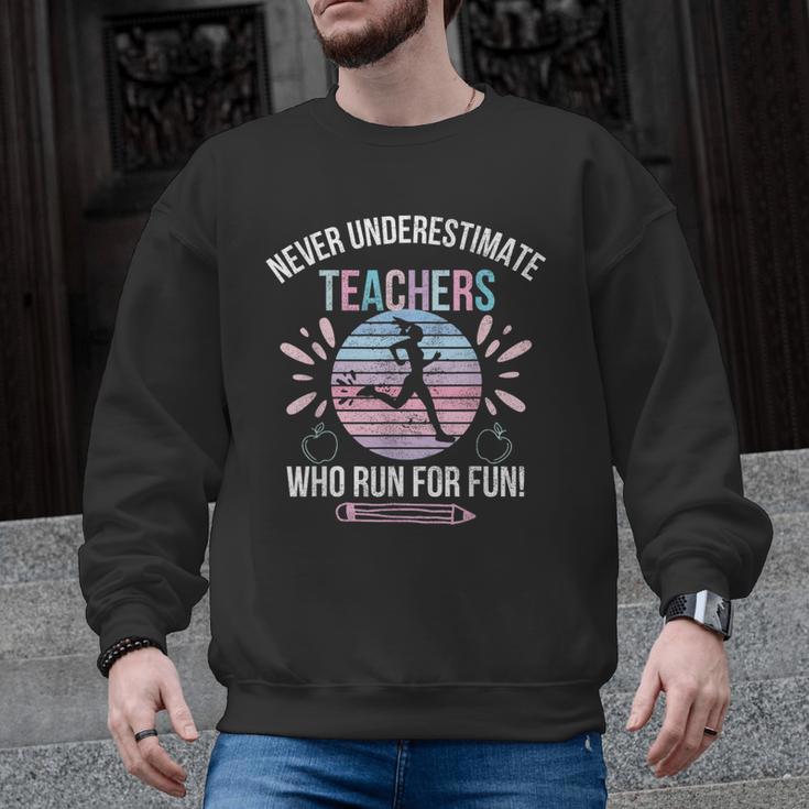 Never Underestimate Teachers Who Runs For Fun Running Teache Men Graphic Sweatshirt