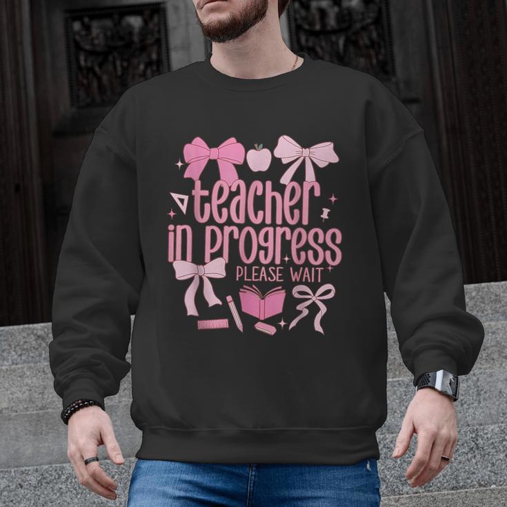 Women Teacher In Progress Coquette Pink Bow Future Teacher Men Graphic Sweatshirt