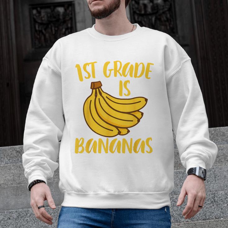 1st Grade Is Bananas Teacher Teaching Back To School Men Graphic Sweatshirt