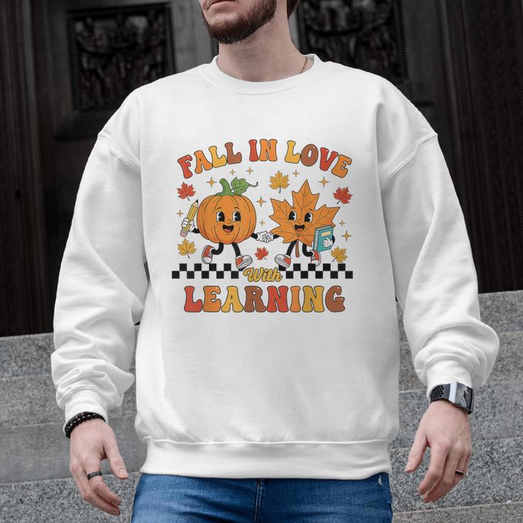 Fall In Love With Learning Teacher Student Autumn Pumpkin Men Graphic Sweatshirt, trending gift Fall In Love With Learning Teacher Student Autumn Pumpkin Men Graphic Sweatshirt, trending gift