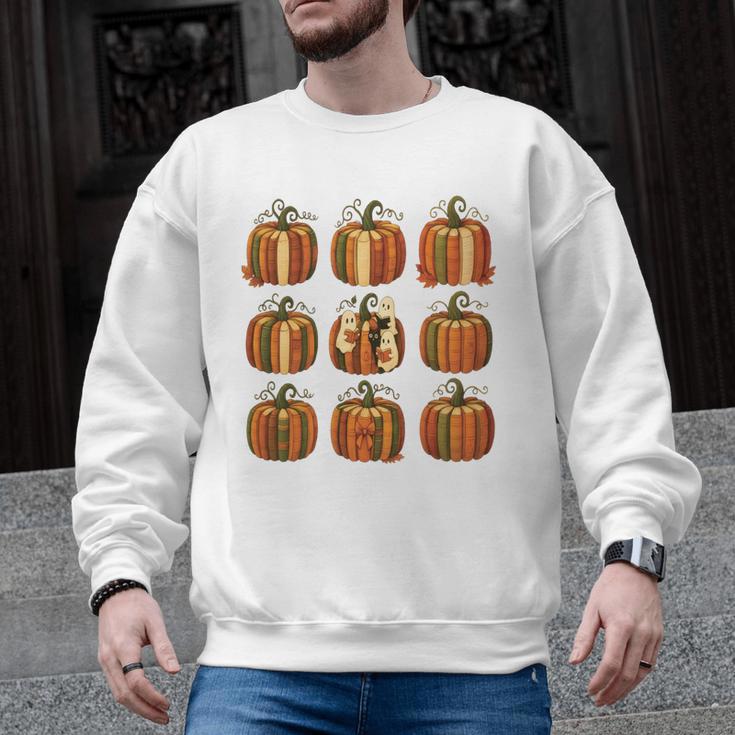 Halloween Teacher Fall Book Pumpkin Retro Reading Men Graphic Sweatshirt