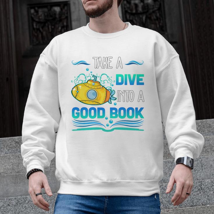 Librarian Teacher Dive Into A Good Book Reading Premium Tri-Blend Men Graphic Sweatshirt