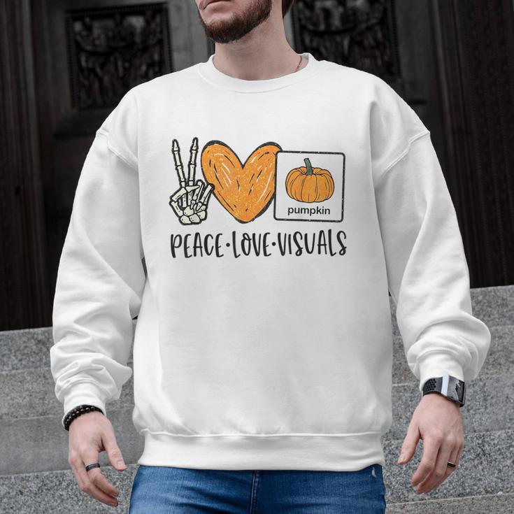 Peace Love Visuals Sped Teacher Pumpkin Skeleton Halloween Men Graphic Sweatshirt