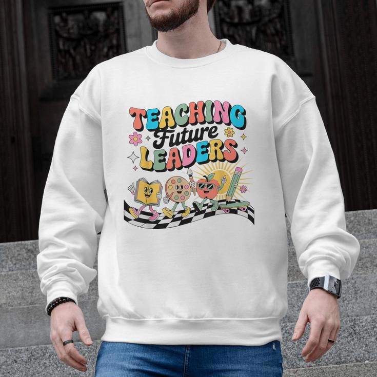 Retro Teaching Future Leaders Groovy Teacher Back To School Men Graphic Sweatshirt