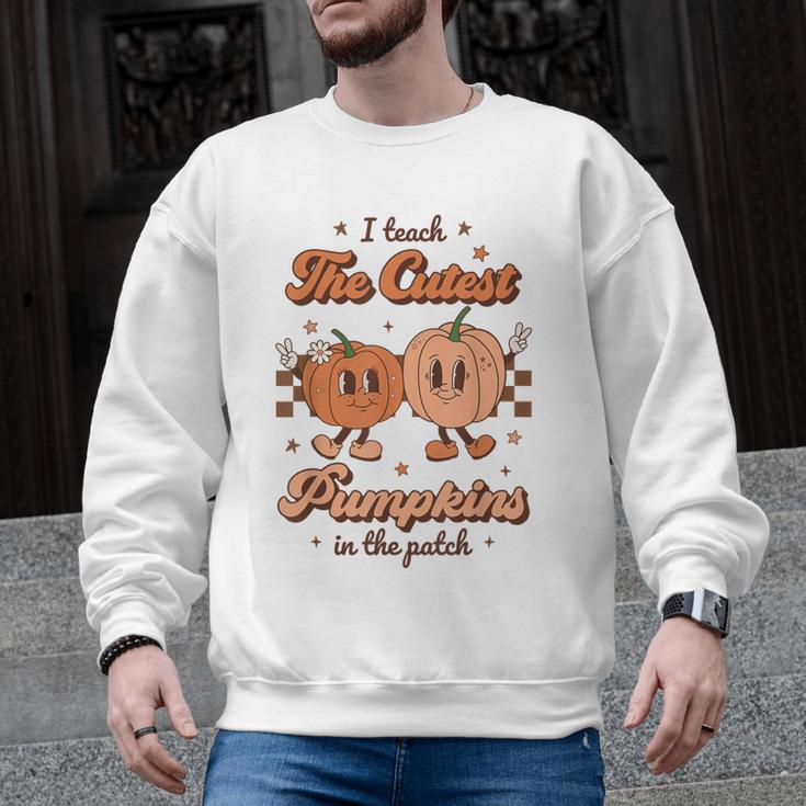 I Teach The Cutest Pumpkins In The Patch Retro Teacher Fall Men Graphic Sweatshirt