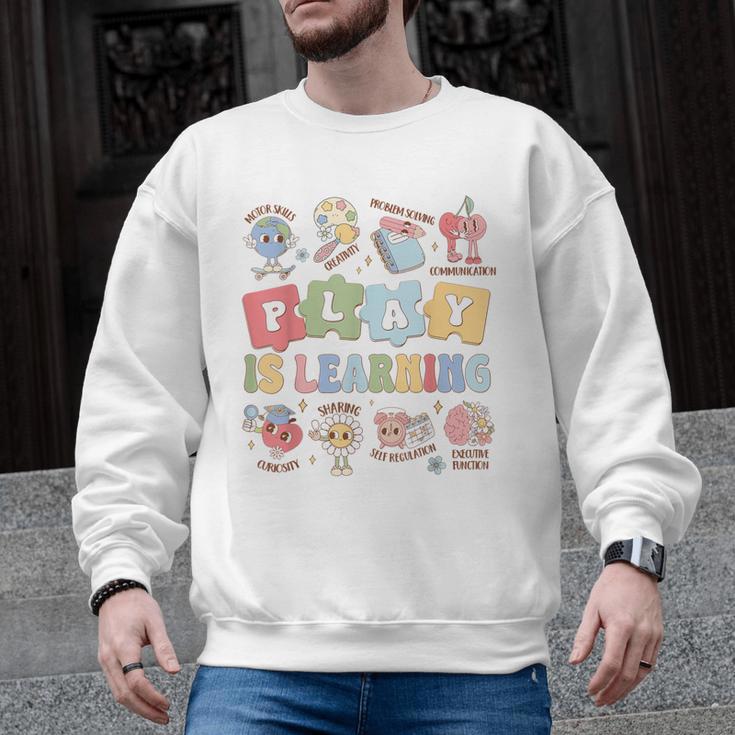 Teacher Groovy Play Is Learning Back To School Men Graphic Sweatshirt