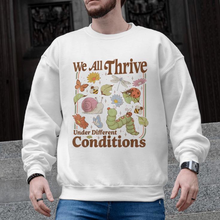 We All Thrive Under Different Conditions SPED Teacher Men Graphic Sweatshirt