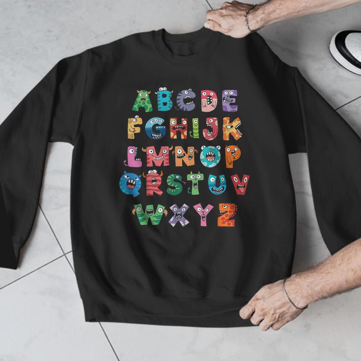 ABC Cute Monster Alphabet Halloween Teacher Costume Kids Men Graphic Sweatshirt, funny design ABC Cute Monster Alphabet Halloween Teacher Costume Kids Men Graphic Sweatshirt, funny design