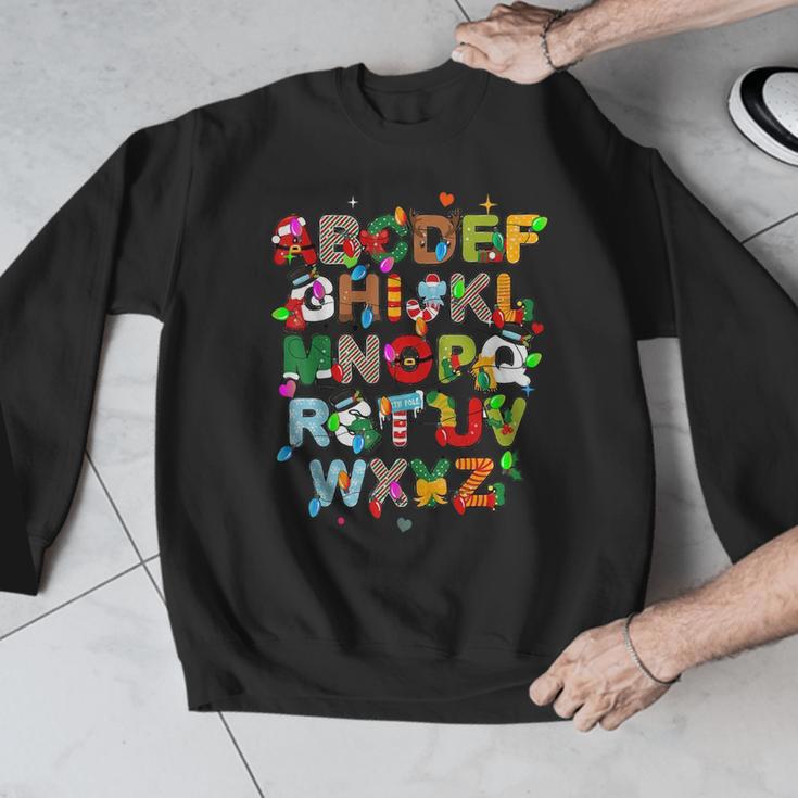 ABCs Learning Kindergarten Teacher Christmas Lights Alphabet For Men Women Kids Men Graphic Sweatshirt, funny design ABCs Learning Kindergarten Teacher Christmas Lights Alphabet For Men Women Kids Men Graphic Sweatshirt, funny design