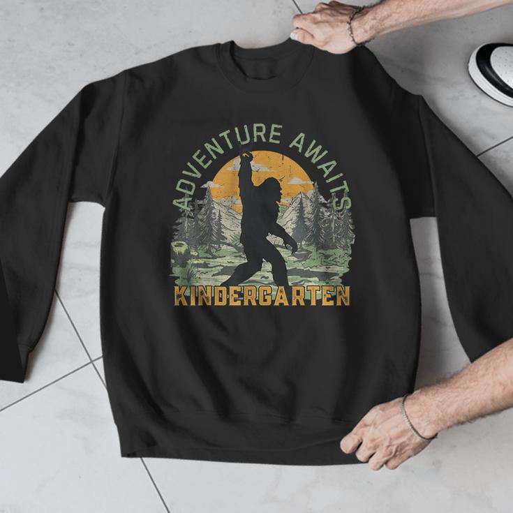 Adventure Awaits Bigfoot Teacher Kindergarten Back To School Men Graphic Sweatshirt, funny design Adventure Awaits Bigfoot Teacher Kindergarten Back To School Men Graphic Sweatshirt, funny design