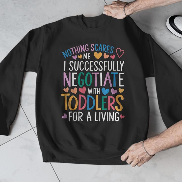 Childcare Teacher Negotiate With Toddlers Daycare Provider Men Graphic Sweatshirt, funny design