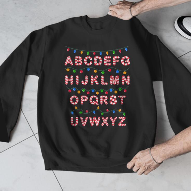 Christmas Alphabet Candy Cane Teachers Students Candy Cane For Men Women Kids Men Graphic Sweatshirt, funny design