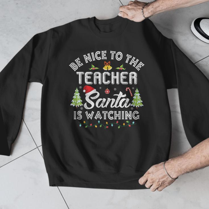 Christmas Be Nice To The Teacher Santa Is Watching Xmas Men Graphic Sweatshirt, funny design Christmas Be Nice To The Teacher Santa Is Watching Xmas Men Graphic Sweatshirt, funny design