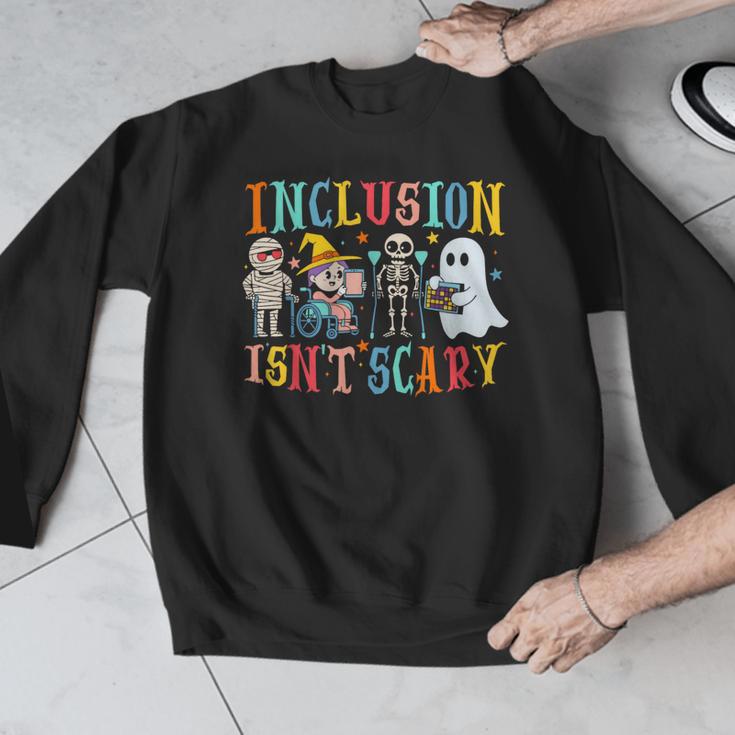 Cute Inclusion Isn't Scary Teacher Skeleton Ghost Halloween Men Graphic Sweatshirt, funny design