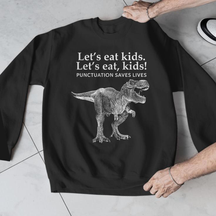 Lets Eat Kids Punctuation Saves Lives Dinosaur Teacher Men Graphic Sweatshirt, funny design