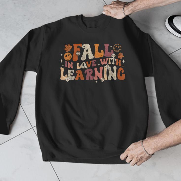 Fall In Love With Learning Autum Thanksgiving Teacher Kids Men Graphic Sweatshirt, funny design