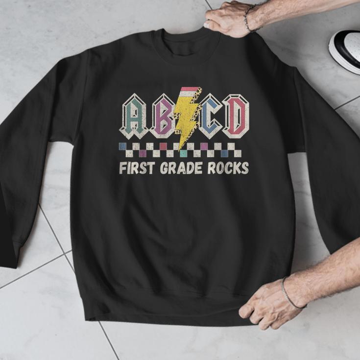 First Grade Rocks Teachers Back To School ABCD Rock Students Men Graphic Sweatshirt, First Grade Teacher Gifts, funny design First Grade Rocks Teachers Back To School ABCD Rock Students Men Graphic Sweatshirt, First Grade Teacher Gifts, funny design
